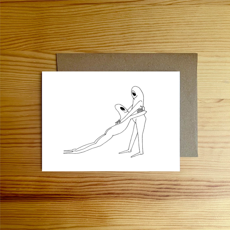 Two people meeting, one is hugging the other's waste and the other is dragging in a deep hug